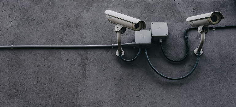 Surveillance cameras that provide security for storage solutions for restaurant renovation