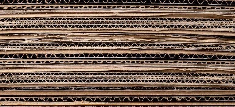 Stacked cardboard you shouldn't use if you opt for green storage practices.
