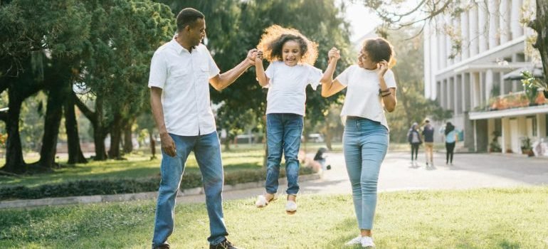 A family having fun in the park in one of the safest neighborhoods in the Bronx.