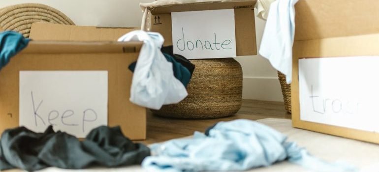 Boxes labeled keep, donate, and trash.
