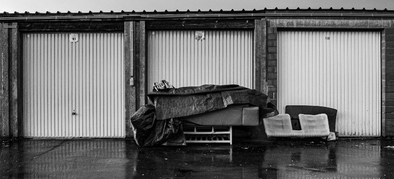 Old furniture outside of storage facility.