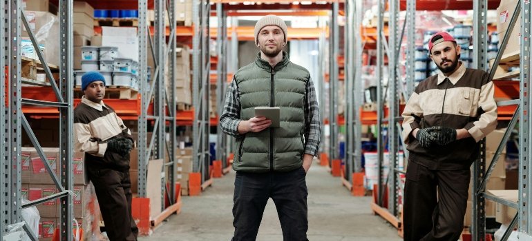 A storage expert stands and explains the best storage practices for businesses with limited office space.