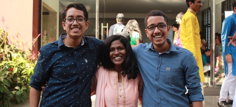 a mom and two sons, an example of NYC teens moving out for college