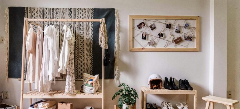 clothes and shoes arranged in a room
