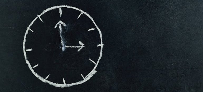 a clock drawn on a board, Save on Storage in NYC This Summer