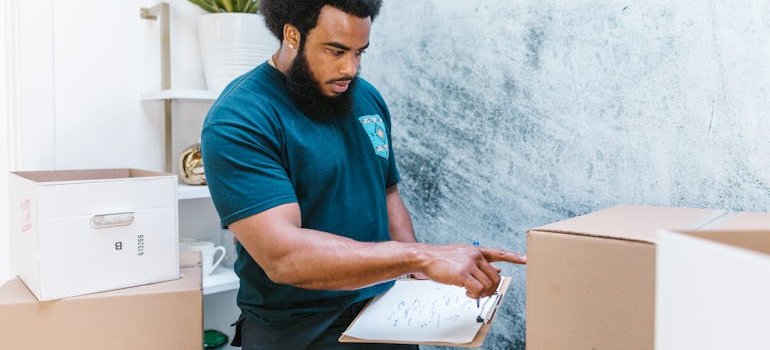 a person pointing at a box
