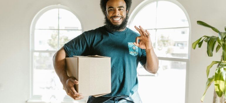 a boy packing fragile not to worry about what to do if your items get damaged in storage
