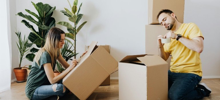 a couple packing boxes in the cheapest NYC neighborhoods for apartment rentals