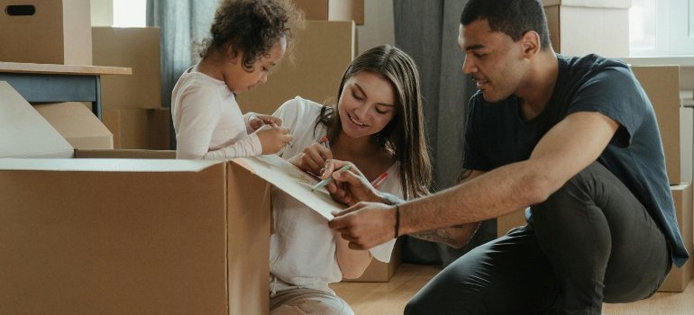 a family ticking boxes in the apartment