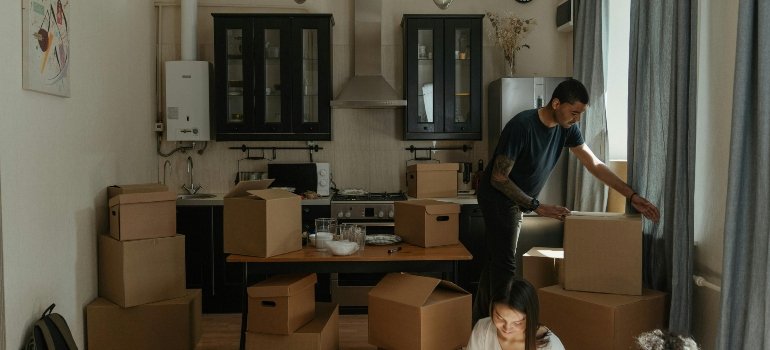 a man packing boxes