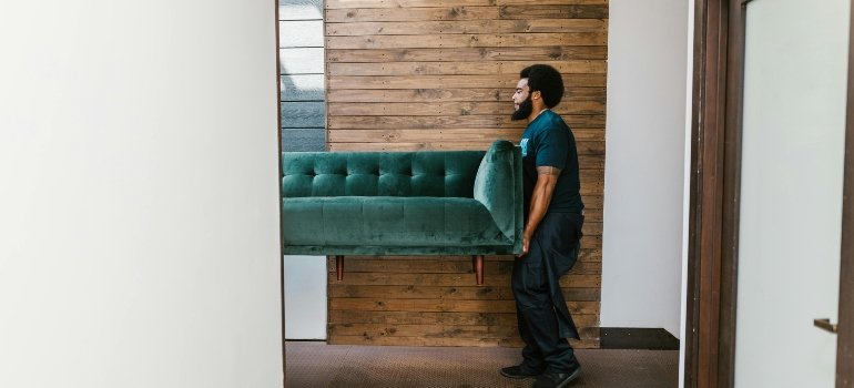 a man holding a bed
