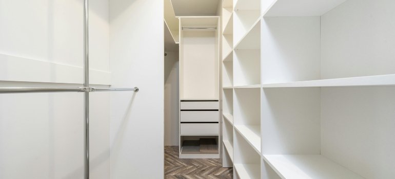 White modern closet ready for clothing storage.