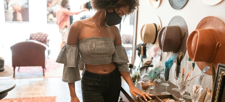 a girl buying glasses for her as being just-married couples living small in NYC