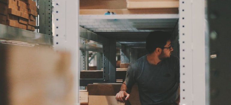 A man working at a cheap storage unit in Manhattan