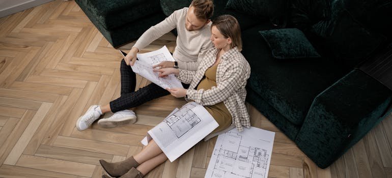 A couple looking at the floor plan