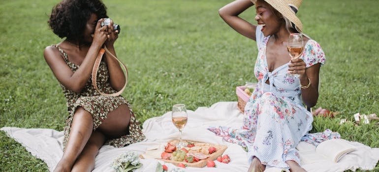Two women in the park in one of the Bronx neighborhoods for outdoor lovers