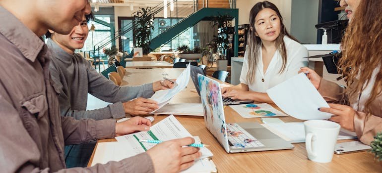 People in the office discussing short term vs long term storage for business needs
