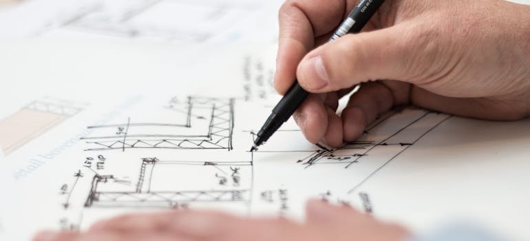 A person making a layout plan