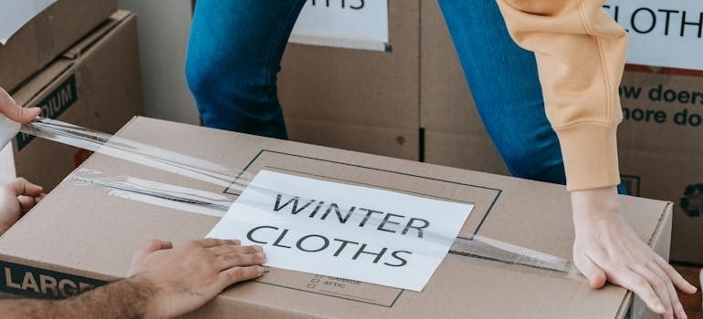A person packing for a Christmas move in NYC
