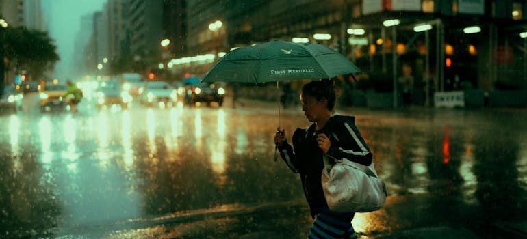 A person on the street while it is raining