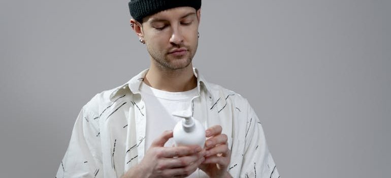 A man holding a bottle