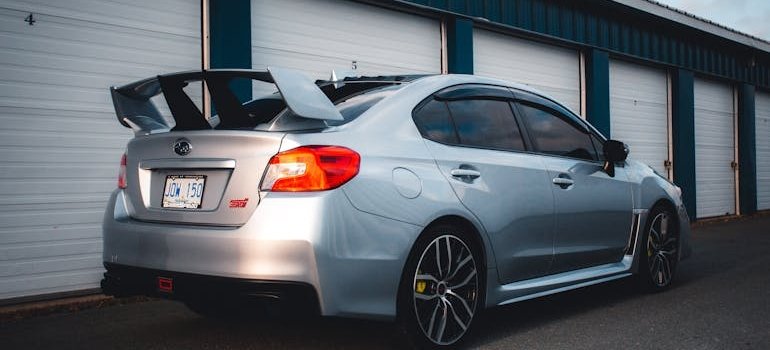 A car in front of the storage