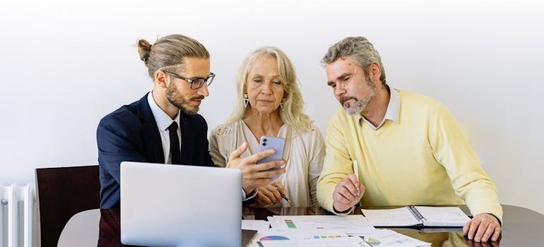 Three people talking about NYC apartment renovation guide
