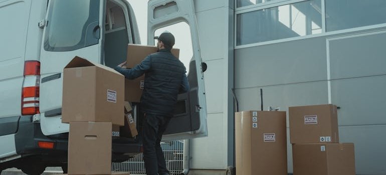 A man unloading boxes