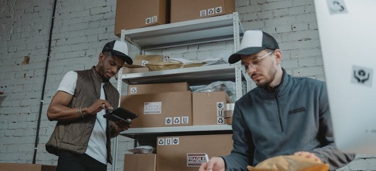 Two people talking about the types of storage units