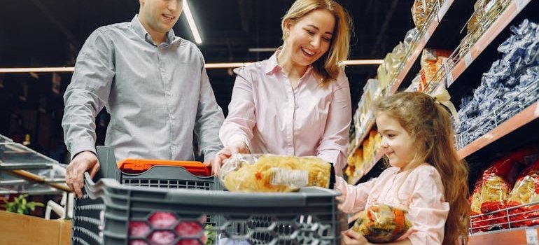 A family doing groceries in the first week in Long Island City after moving
