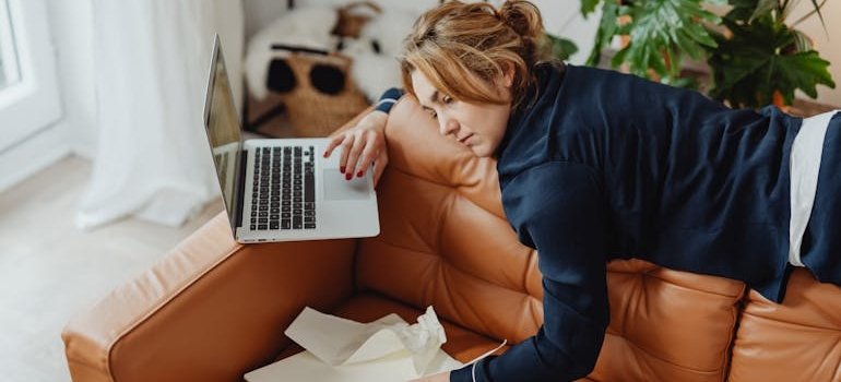 A woman working form home thinking about storage for remote workers in Manhattan apartments
