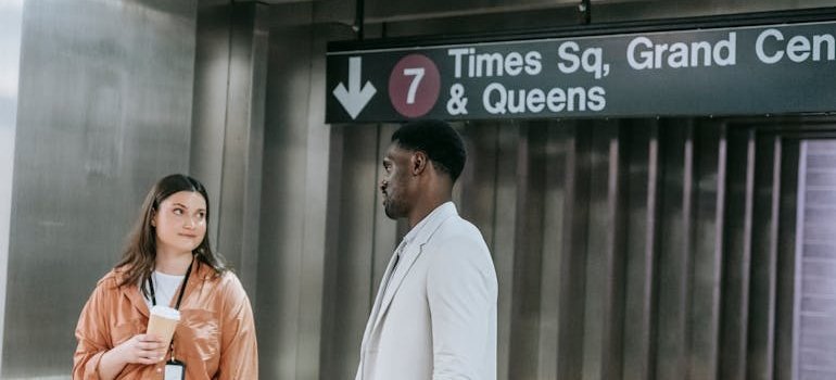 Two people at the train station