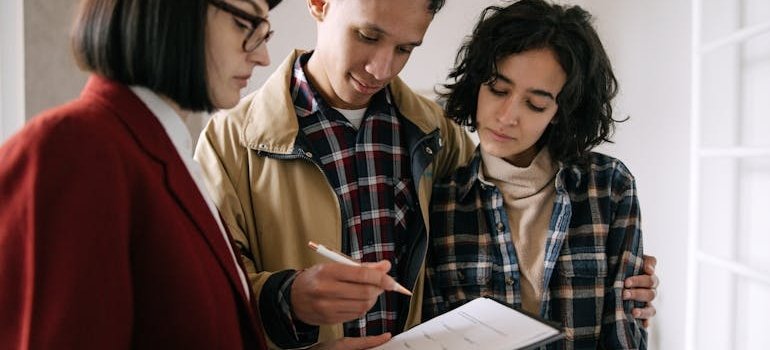 A couple looking at the NYC lease clauses that affect storage plans