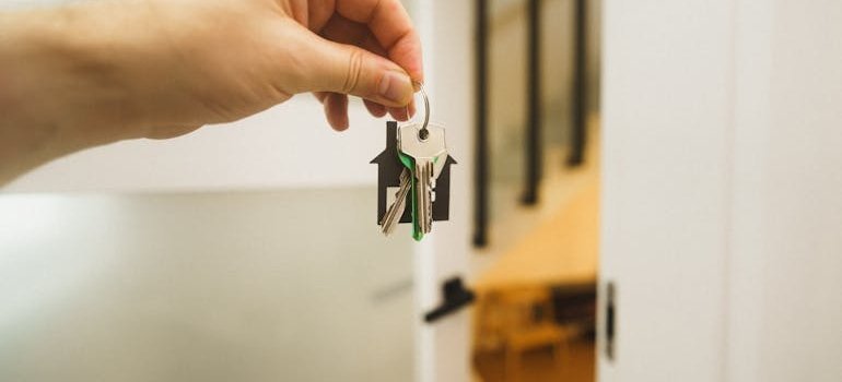 A person holding keys