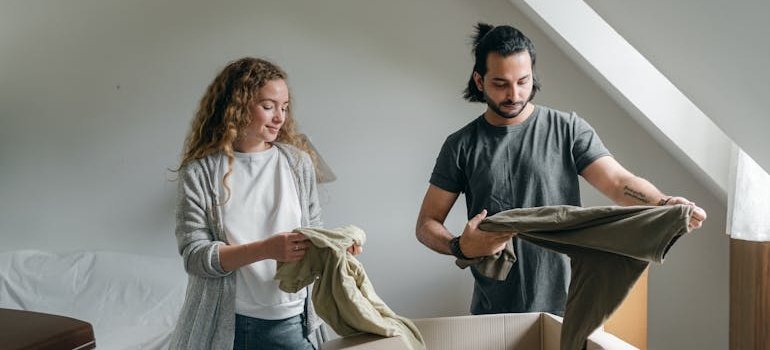 A couple packing and talking about why Manhattan residents rely on small storage units