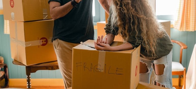 A couple packing and talking about when short term storage works better than long term