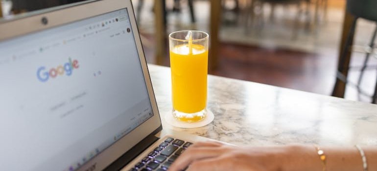 A person using laptop to find affordable storage units near you