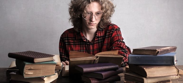 Books in front of the student