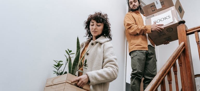 Two people relocating and talking about what to do with your car when moving