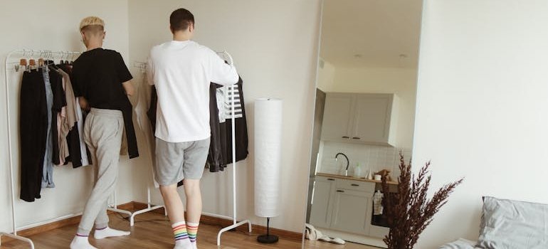 A couple looking at clothes