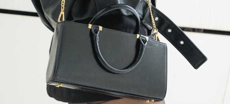 A woman carrying a hand bag