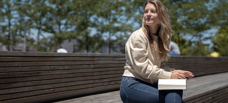 A woman enjoying Manhattan on a budget