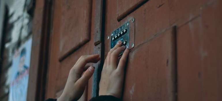 A person using keypad