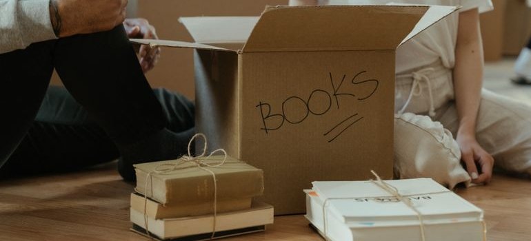 People packing books