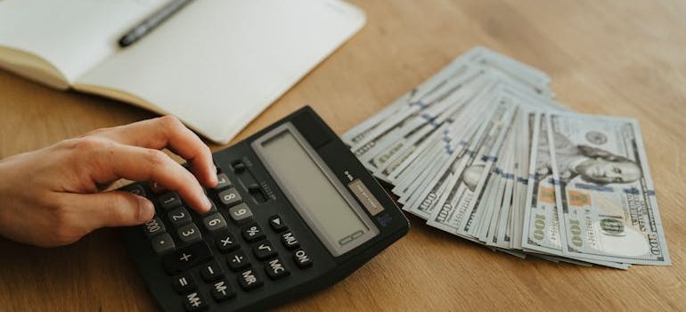 A person using a calculator