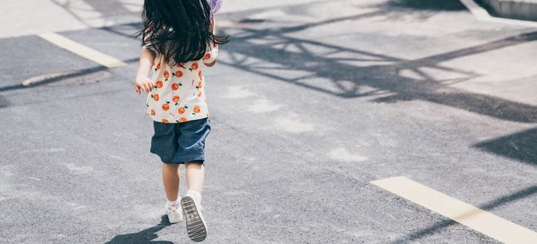 A kid on the street in one of the Bronx neighborhoods with the lowest crime rates