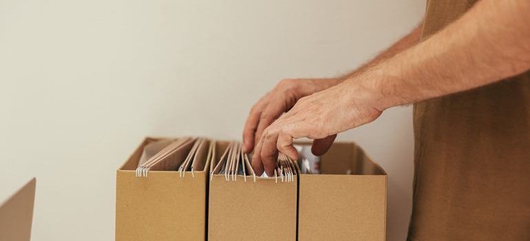 A person looking at the documents