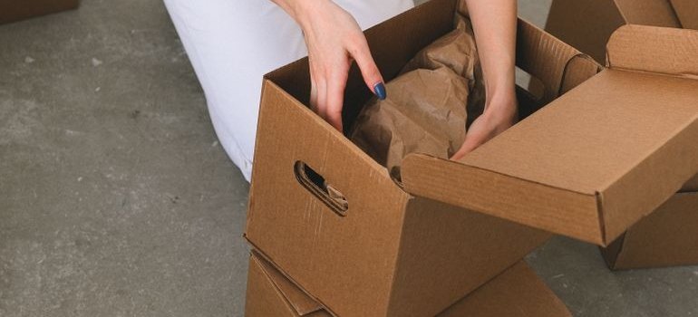 A person packing for self storage Parkchester